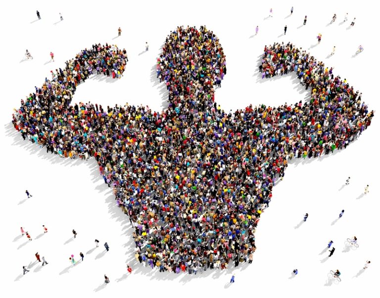 Hundreds or thousands of people - Aerial - Forming "Strong Man"